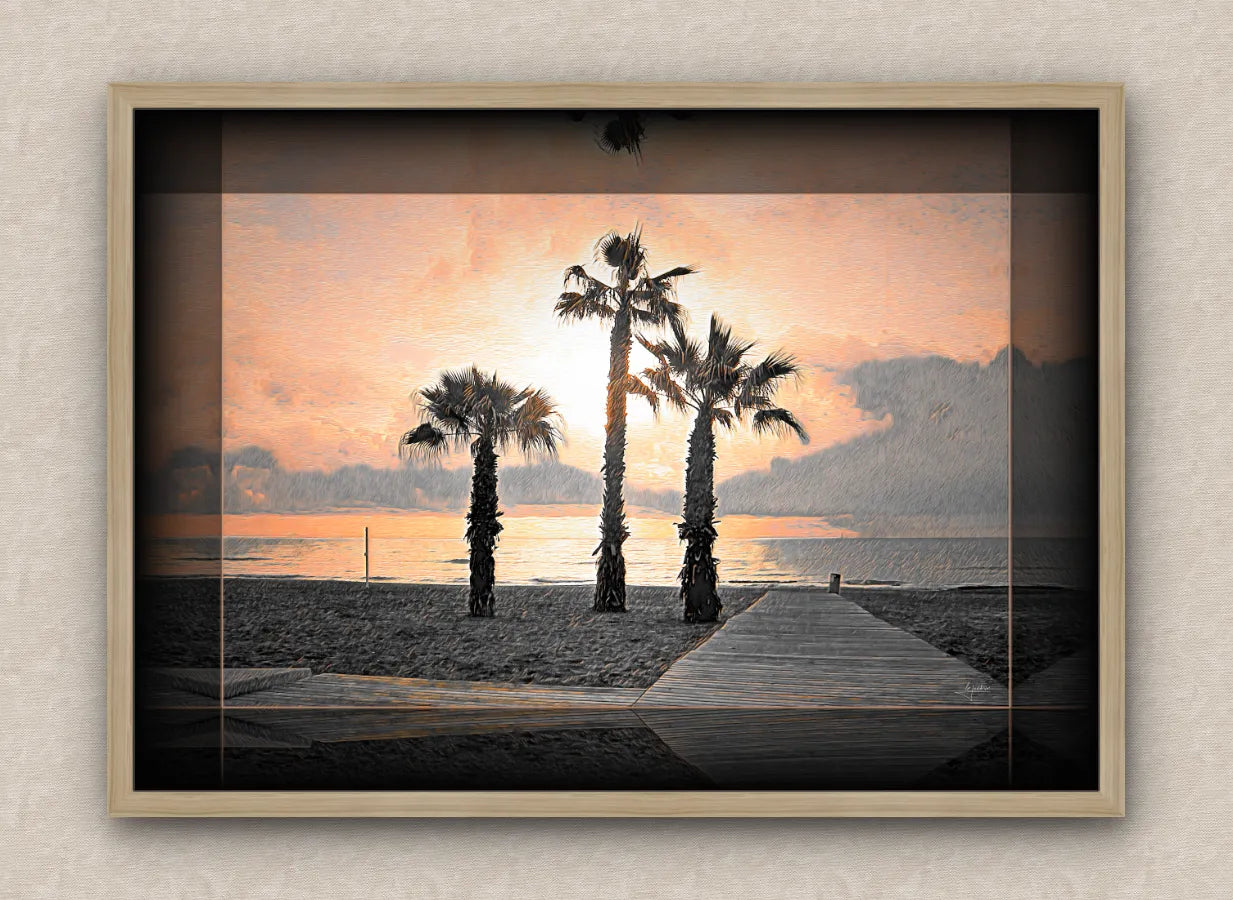 Landscape artwork depicting a beach and palm trees; with dark borders and oak frame, on a beige wall