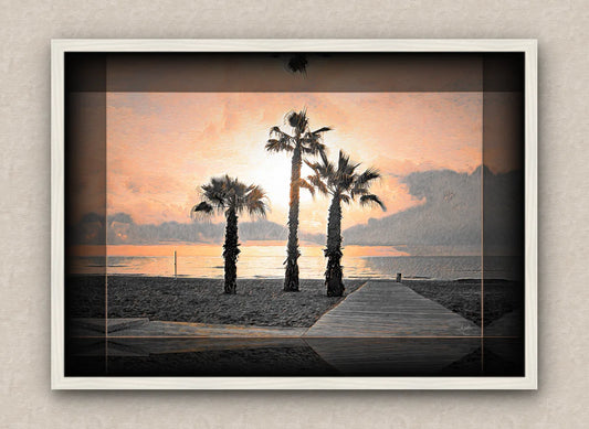 Landscape artwork depicting a beach and palm trees; with dark borders and white frame, on a beige wall