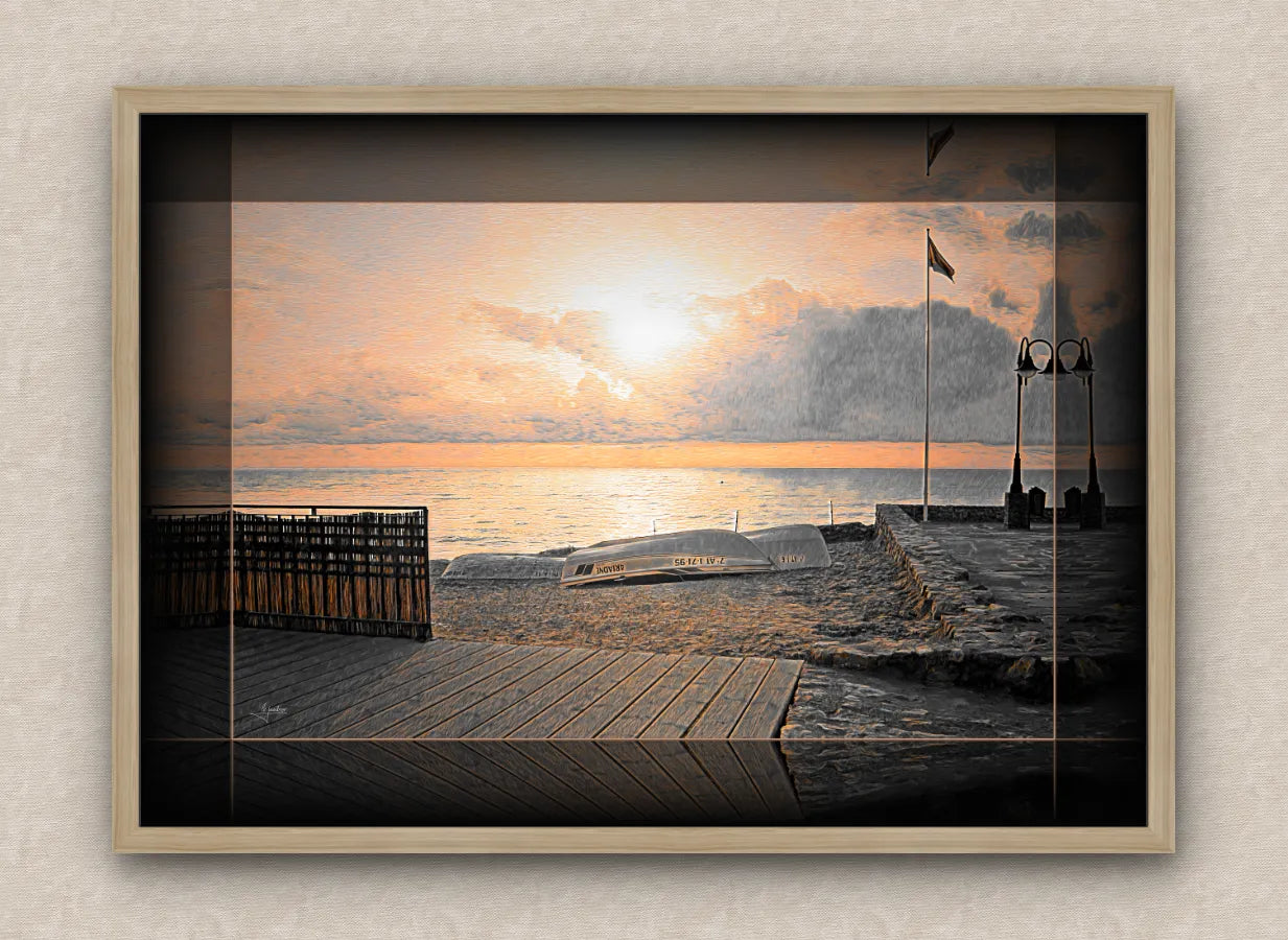 Landscape artwork of an old sea pier, boats and boardwalk; with dark borders and oak frame, on a beige wall