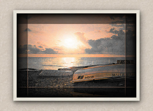 Landscape artwork of an old sea pier, boats and beach; with dark borders and white frame, on a beige wall