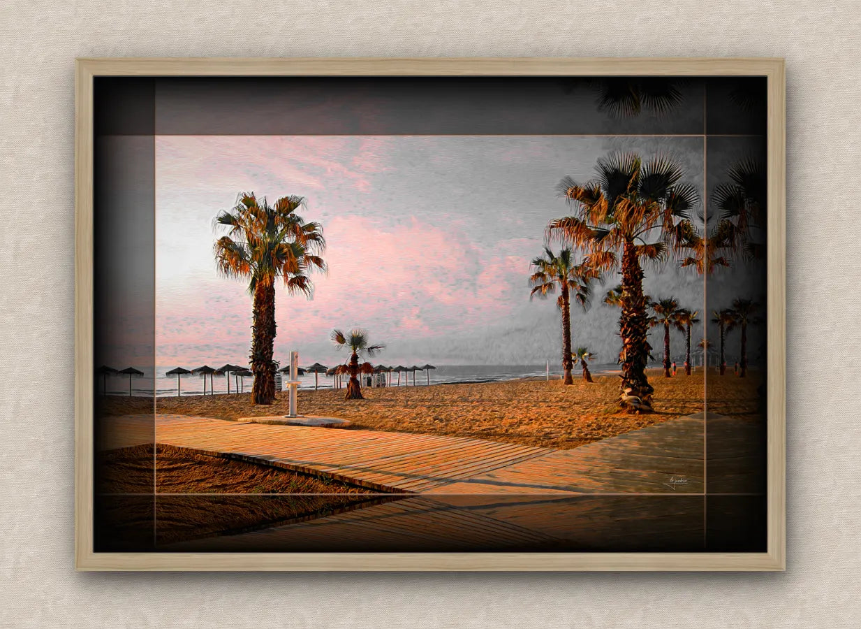 Landscape artwork of a beach and palm trees; with dark borders and oak frame, on a beige wall