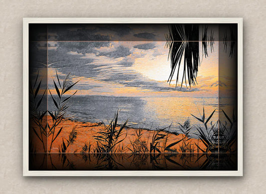 White framed artwork of a sunrise over the sea with reeds and palm leaves in the foreground.