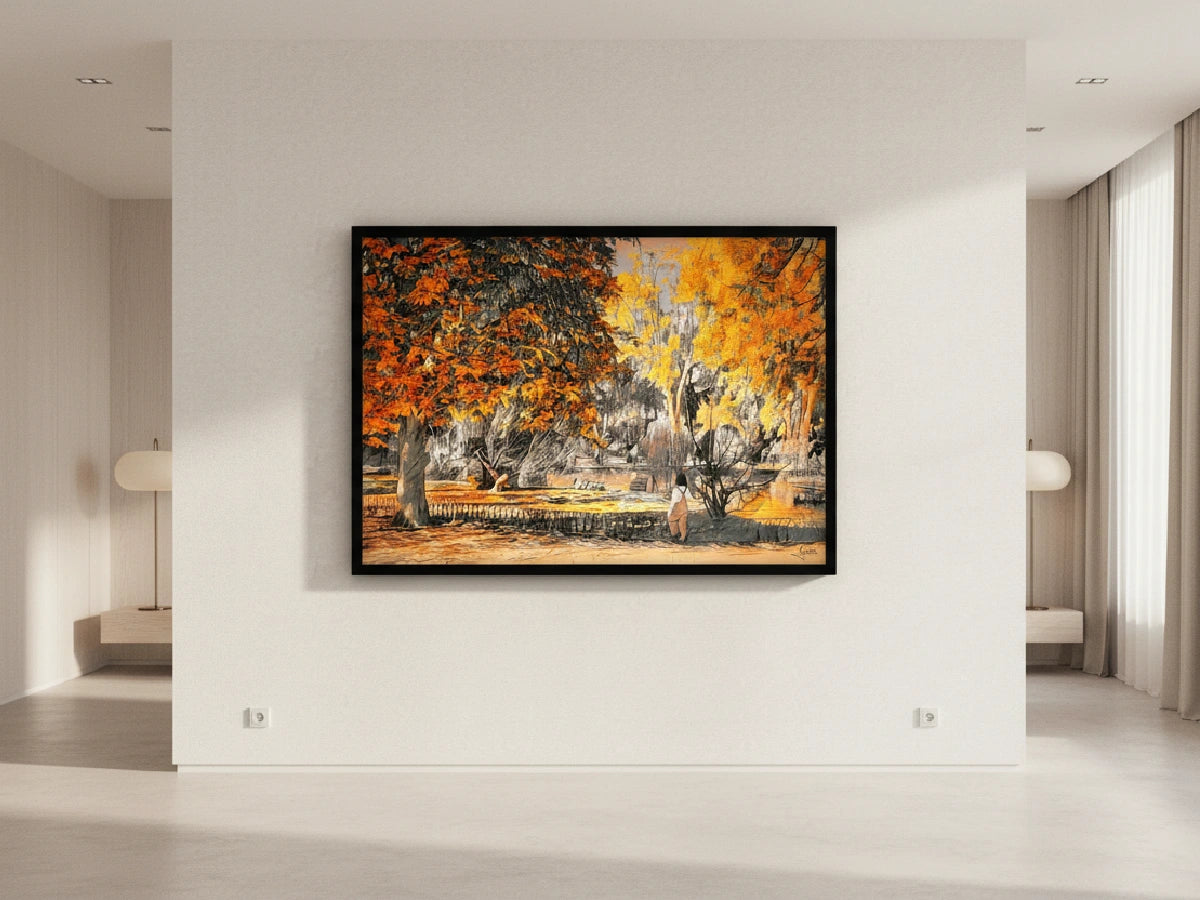 Black framed landscape artwork with autumn colors in a modern room.