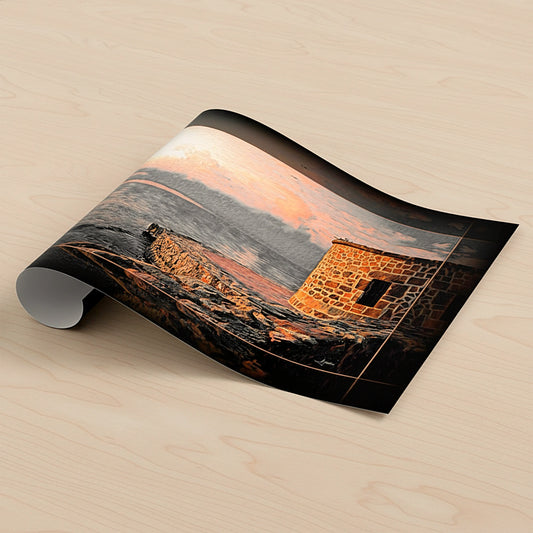 A rolled-up art print showing a dramatic coastal scene with a stone tower