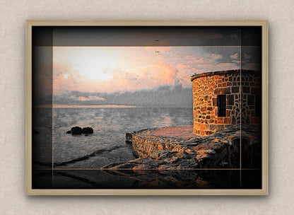 Old sea pier and tower landscape artwork in predominant orange tones, with dark borders and oak frame; on a beige wall