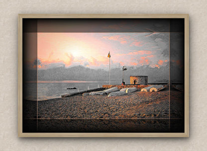 Landscape artwork of an old sea pier, tower and boats; with dark borders and oak frame, on a beige wall
