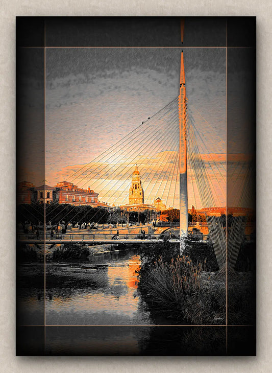 Cityscape artwork of a modern footbridge and buildings over a river during sunrise; with dark border.