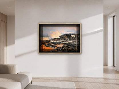 Framed artwork of a seascape in a modern living room.