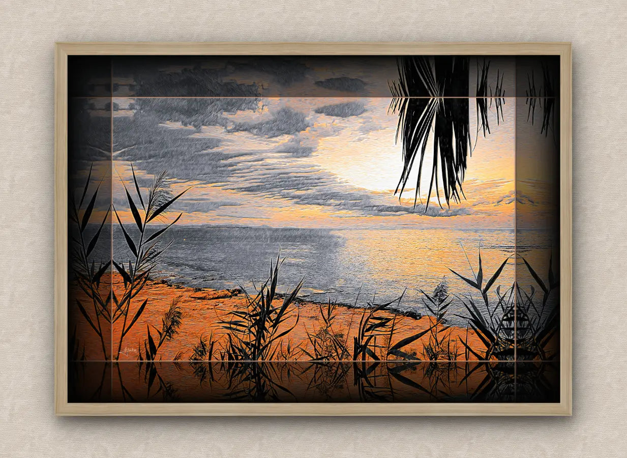 Oak framed artwork of a sunrise over the sea with reeds and palm leaves in the foreground.