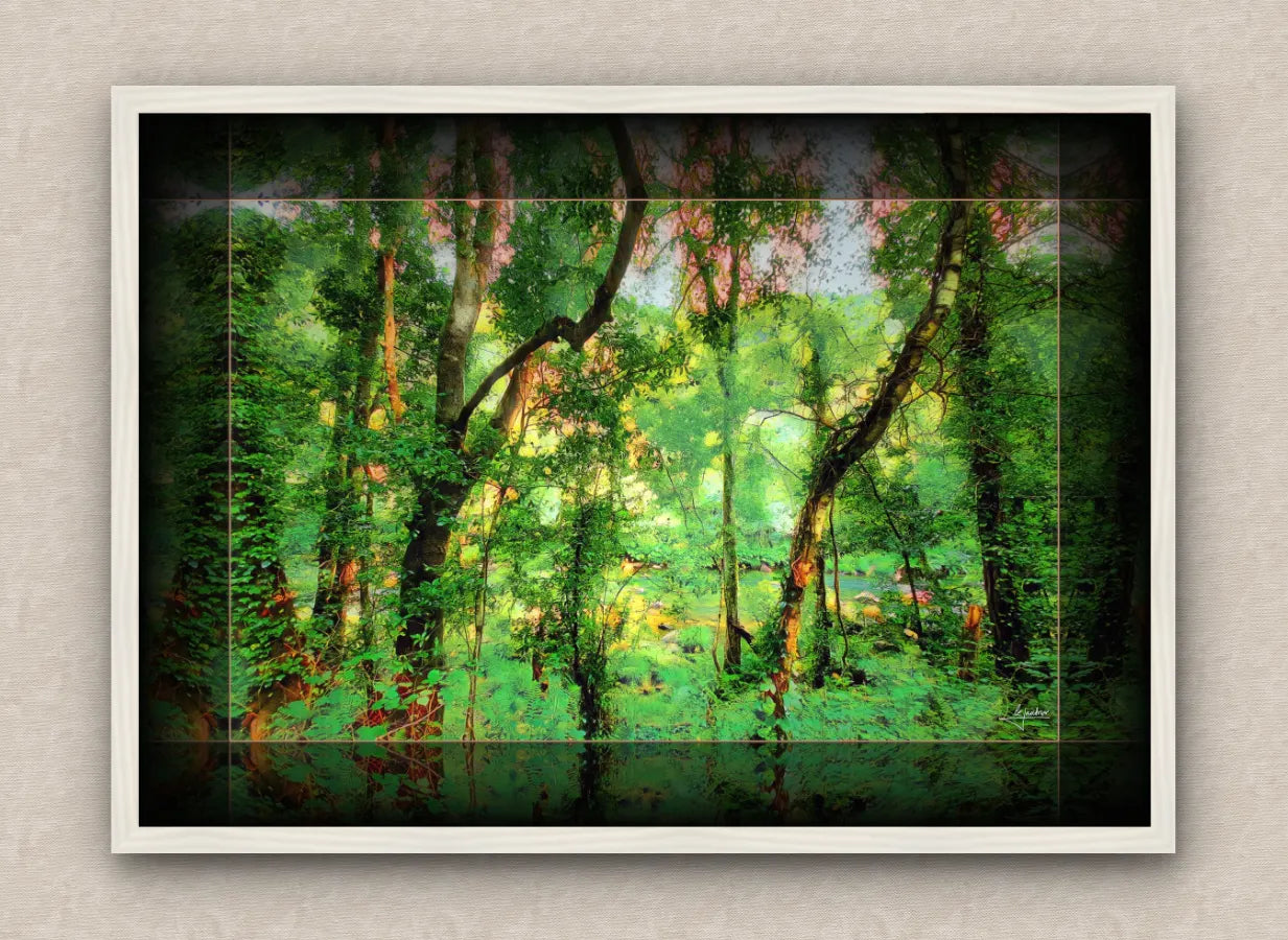 White framed artwork of a forest scenery with vibrant lush greenery.
