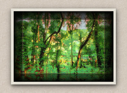 White framed artwork of a forest scenery with vibrant lush greenery.
