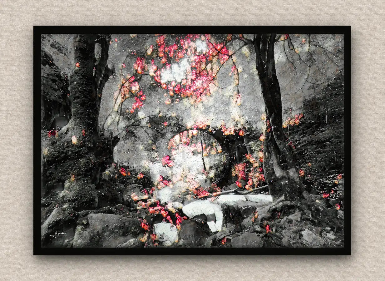 Winter scene wall art framed in black featuring a snowy forest with lush vegetation and an arch bridge