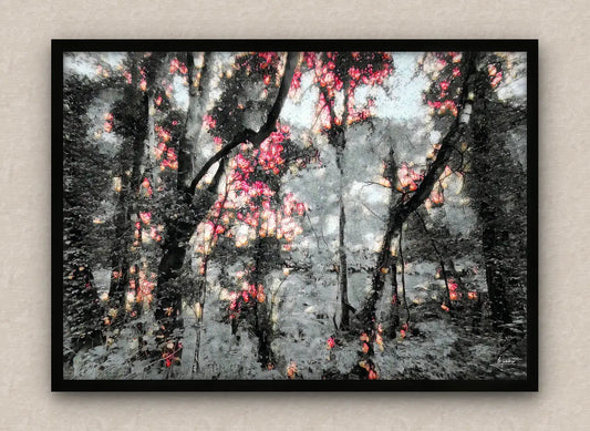 Winter scene wall art framed in black featuring a snowy forest with lush vegetation