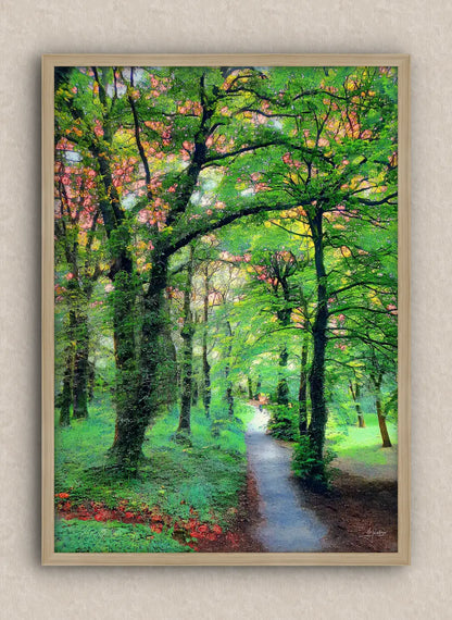 Wall artwork consisting of a landscape in portrait with a lush green forest and a path, framed in oak