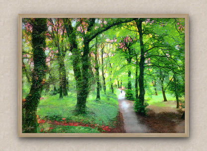 Wall artwork consisting of an impressionist painting with a lush green forest and a path, framed in oak