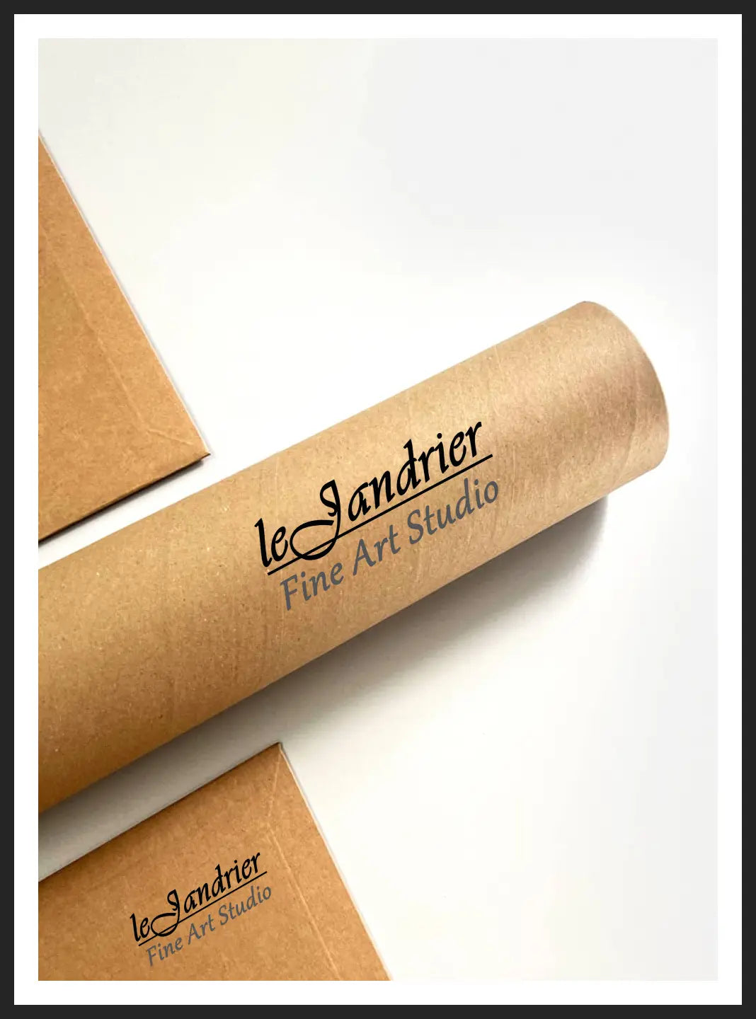 Partial view of branded packaging set comprised of cardboard tube and envelopes, all bearing LeJandrier Fine Art Studio logo