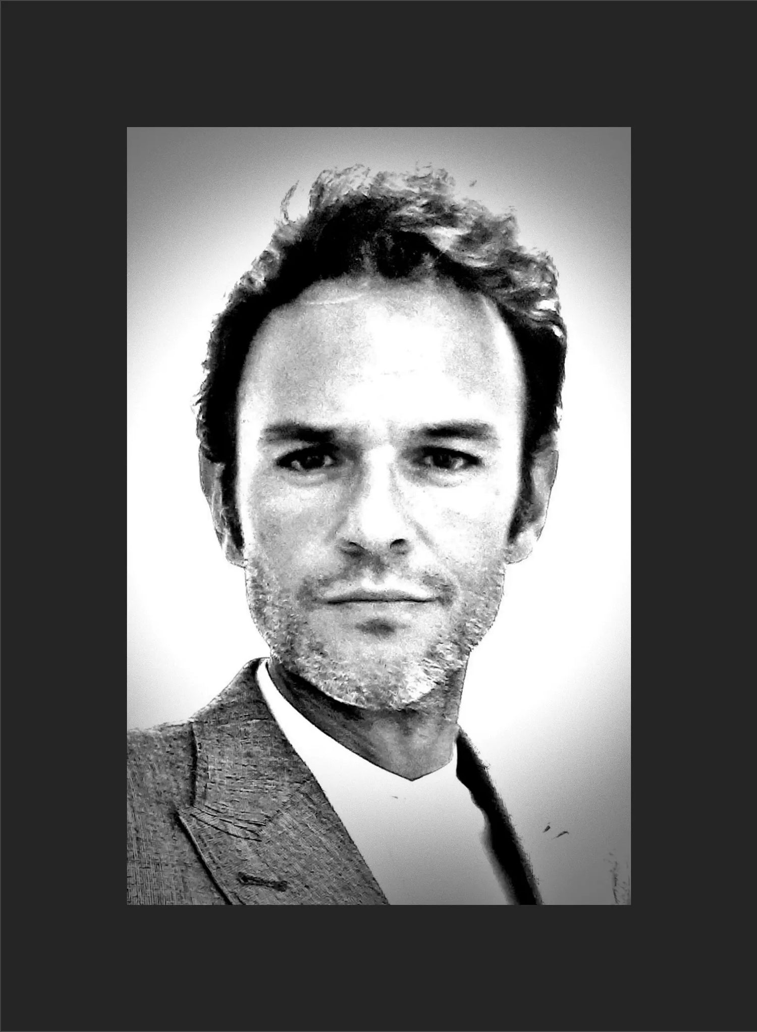 Portrait photograph of Lejandrier wearing a suit